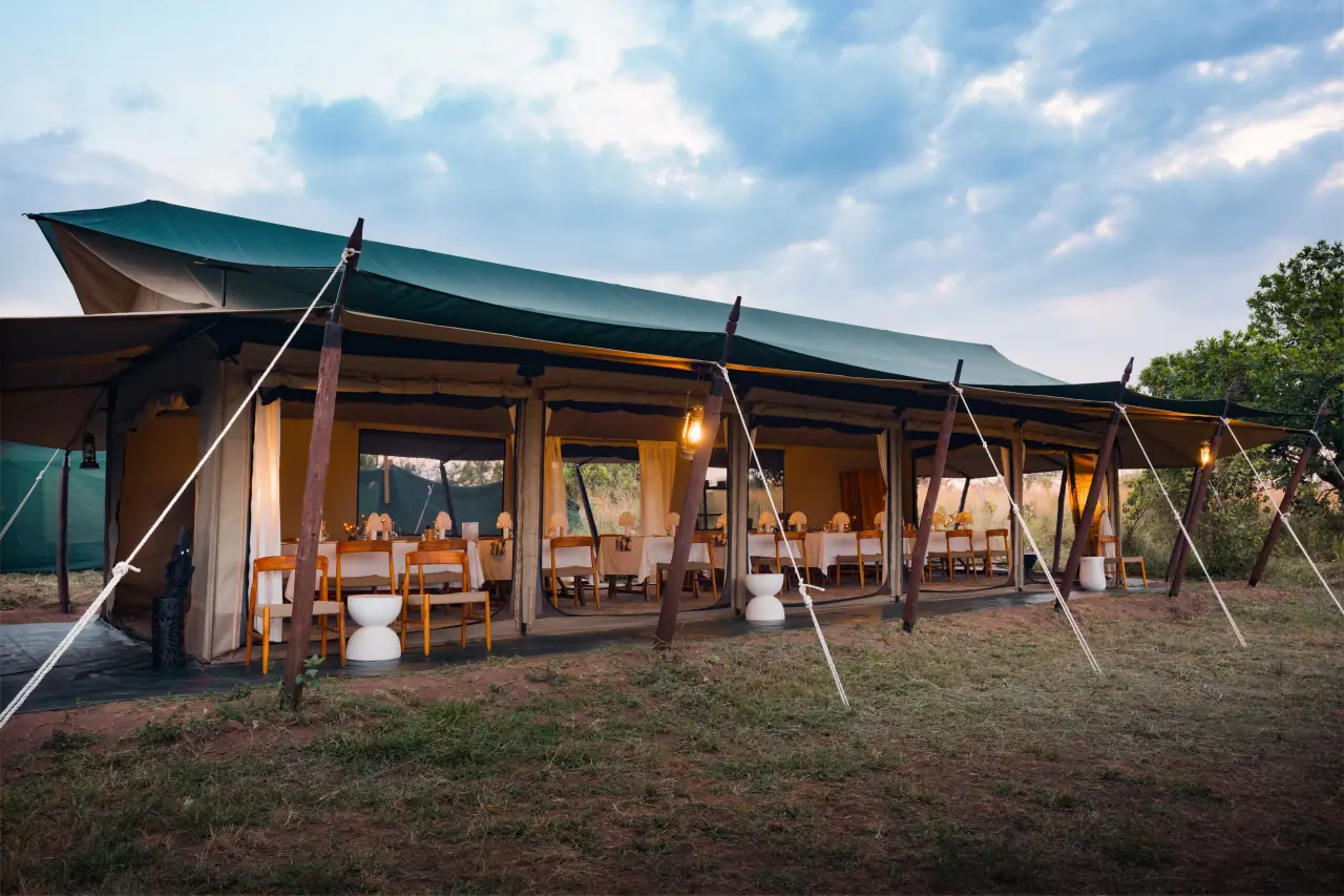 The open dining and lounge tent of the mobile camp on the savannah