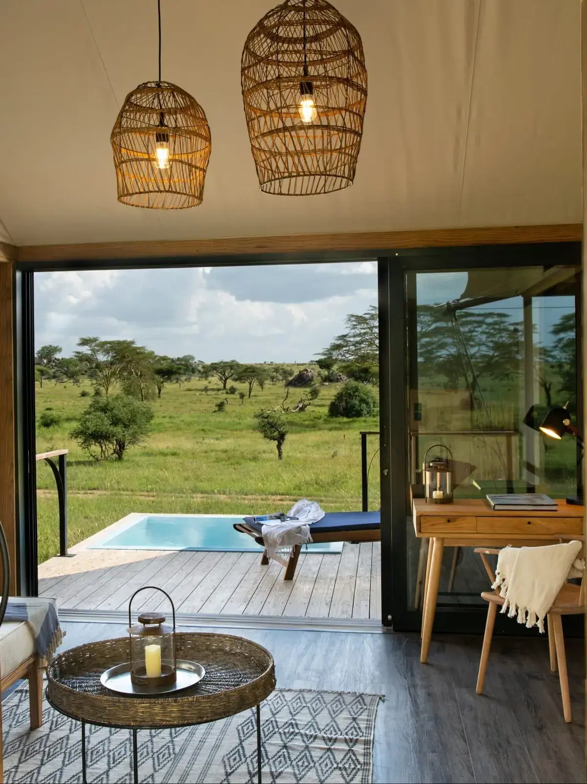 Guest tent lounge at Lemala Nanyukie opening onto a private plunge pool and deck overlooking the Tarangire plains