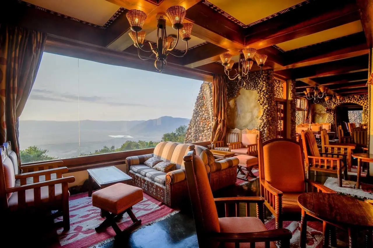 Lounge terrace at Ngorongoro Serena Safari Lodge with chandeliers and a view down into the Ngorongoro Crater