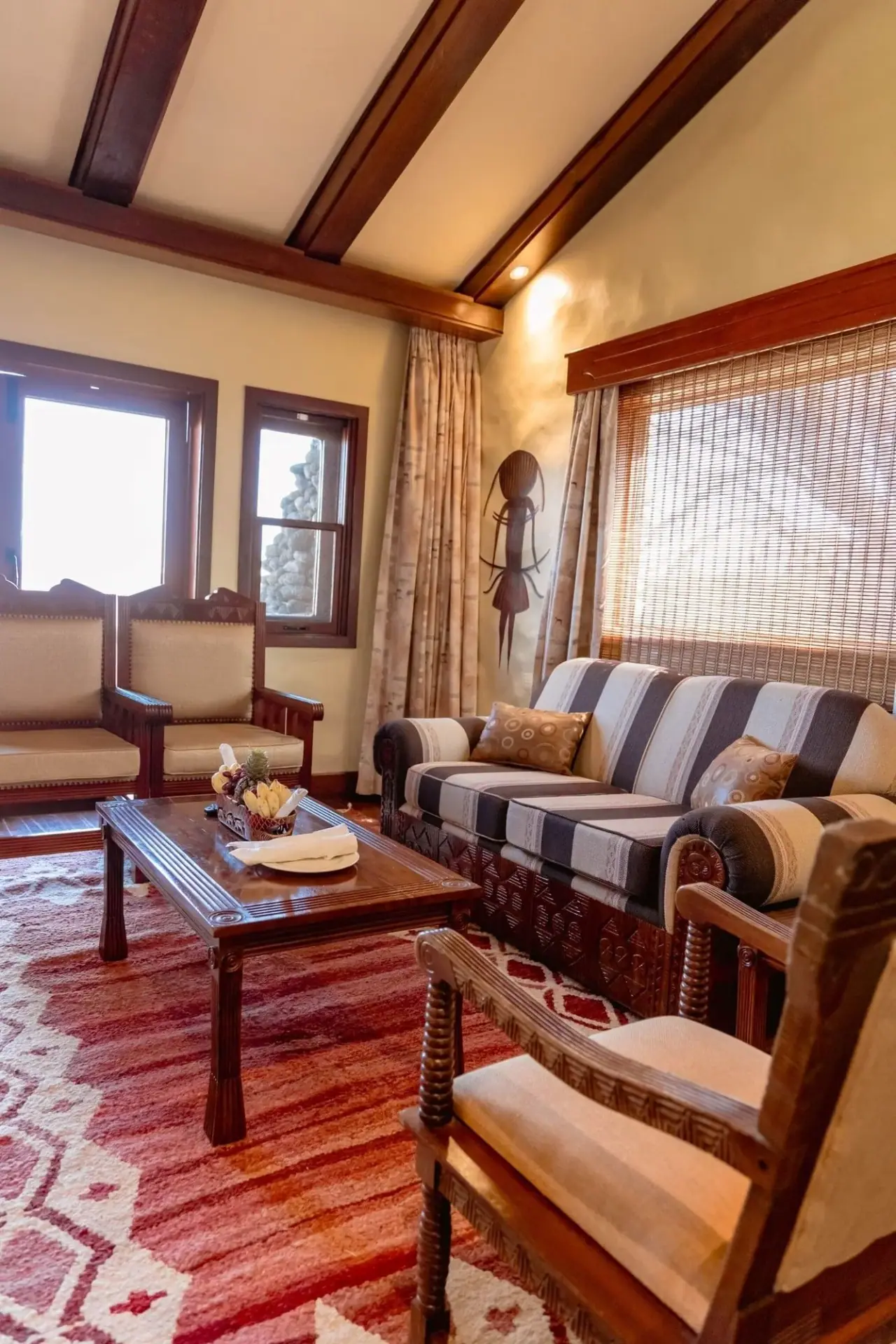 Striped-sofa sitting room at Ngorongoro Serena Safari Lodge